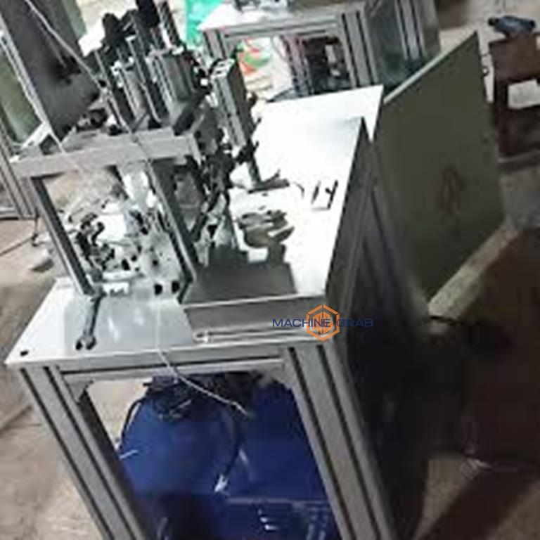 MASK PUNCHING MACHINE 